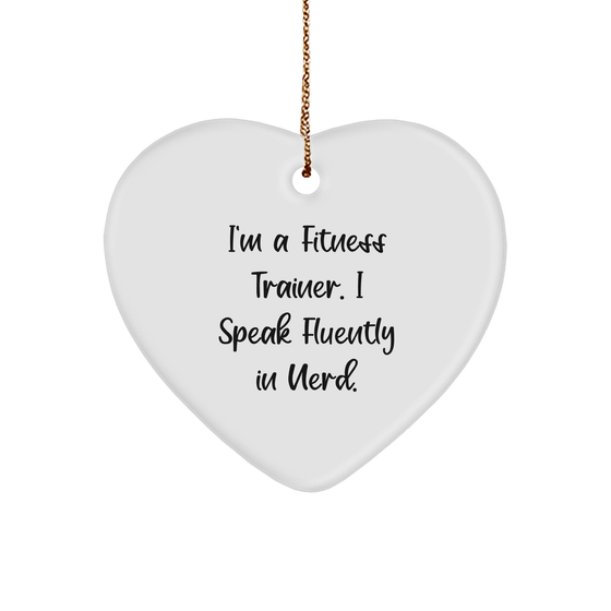 Fitness Trainer Gifts from Friends - Funny Heart Ornament for Christmas with Quote 'I'm A Fitness Trainer. I Speak Fluently In genius.' - Image 1