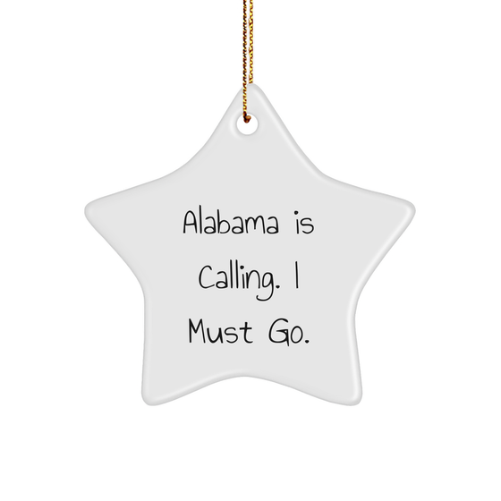 Alabama Inspired Star Ornament Gifts for Alabama Fans: Funny Alabama Is Calling I Must Go Christmas Decoration, White Star Shaped MDF with Gold Cord - Image 1